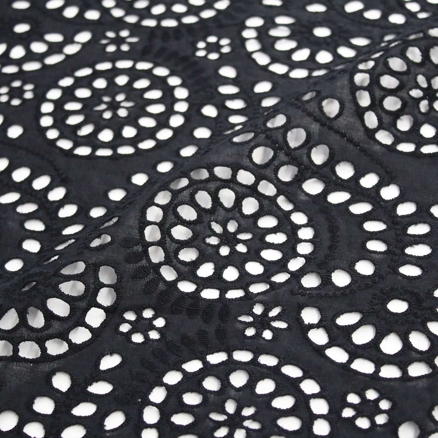Sangallo Lace with Circles and Abstract Pattern