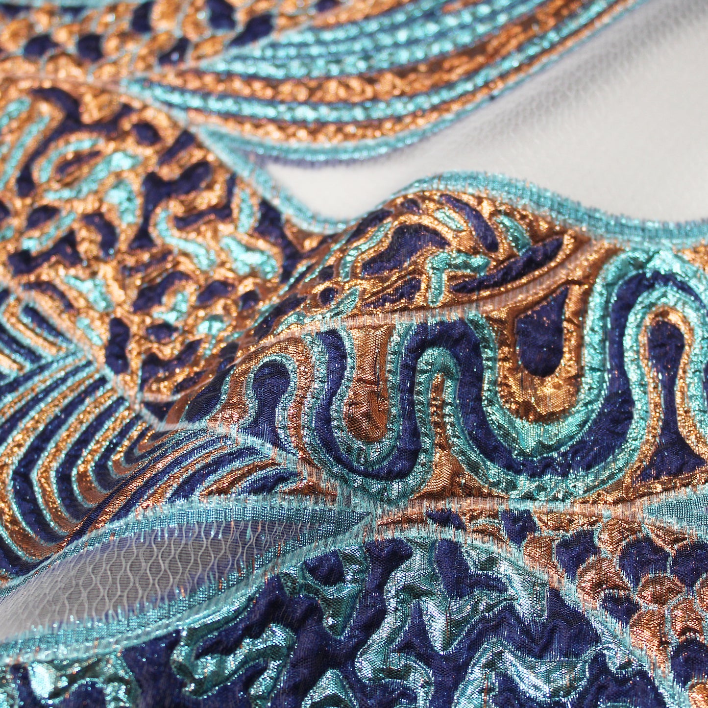 Brocade Fabric with Abstract Waves and Scales Pattern