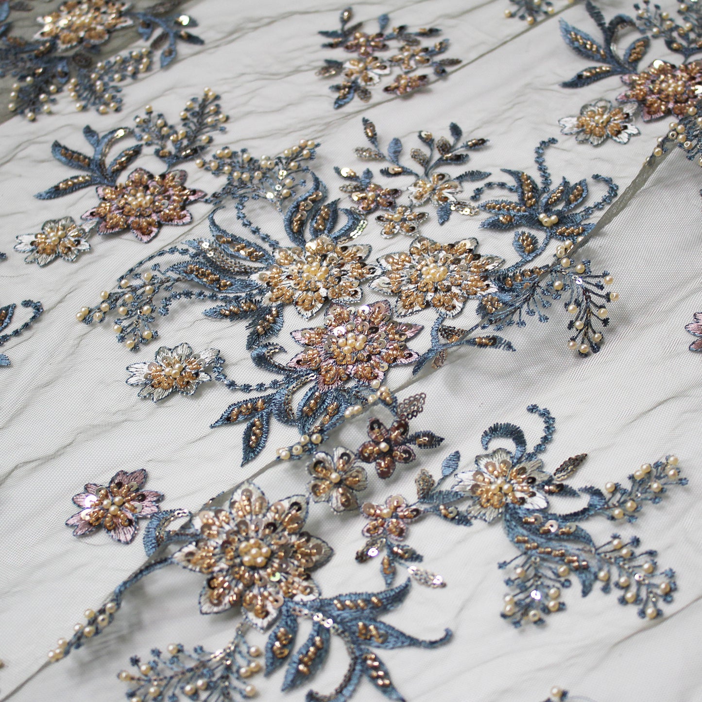 Embroidered Tulle with Star Flowers, Paillettes, Corals, and Beads