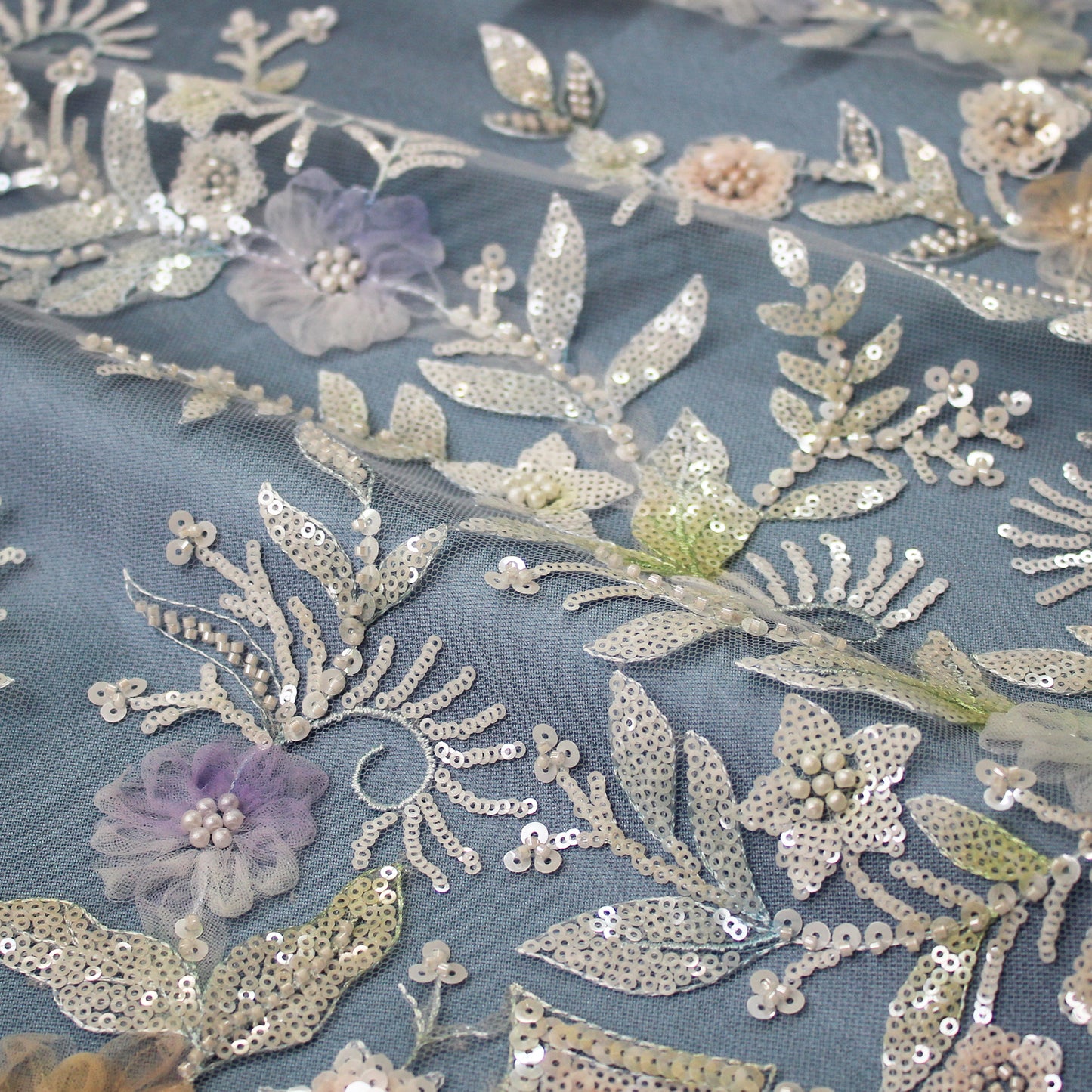 Embroidered Tulle with Ombre Tulle Flowers, Leaves, Paillettes, and Corals
