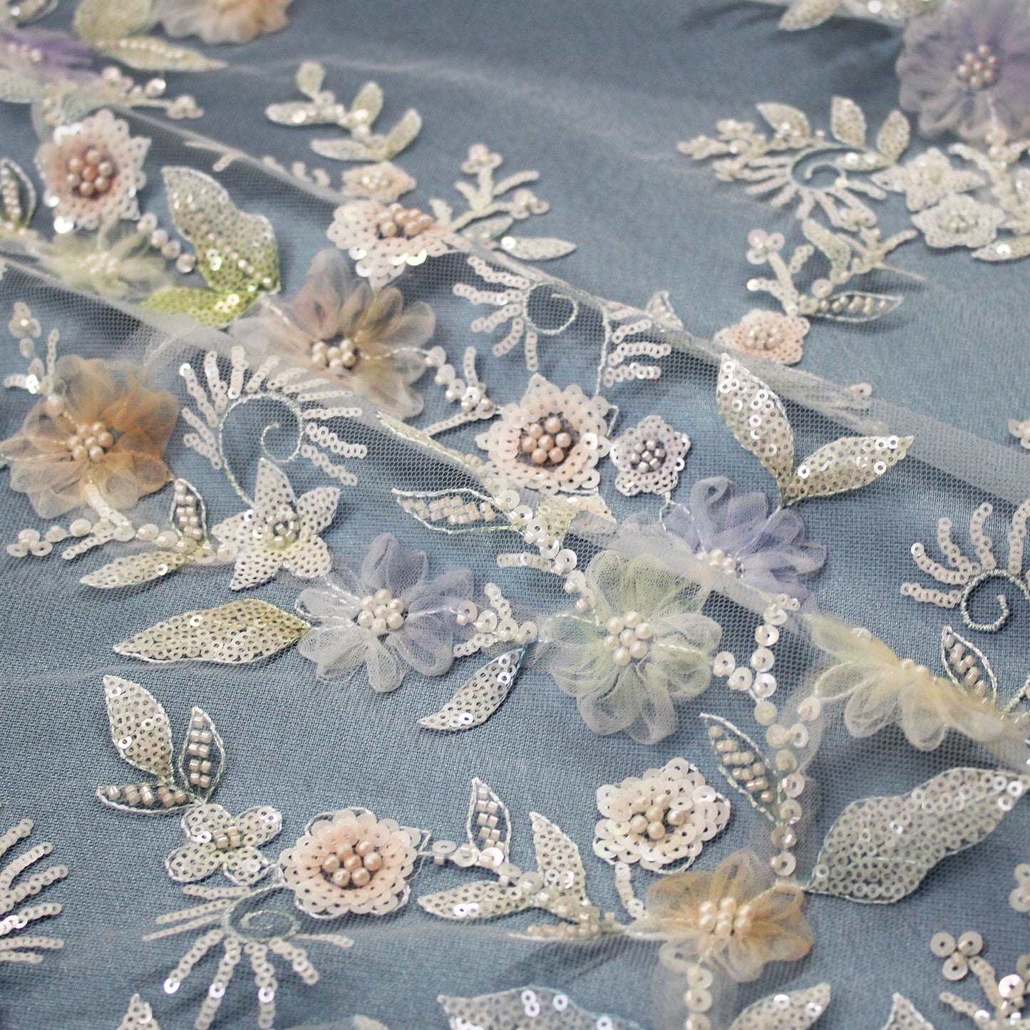 Embroidered Tulle with Ombre Tulle Flowers, Leaves, Paillettes, and Corals