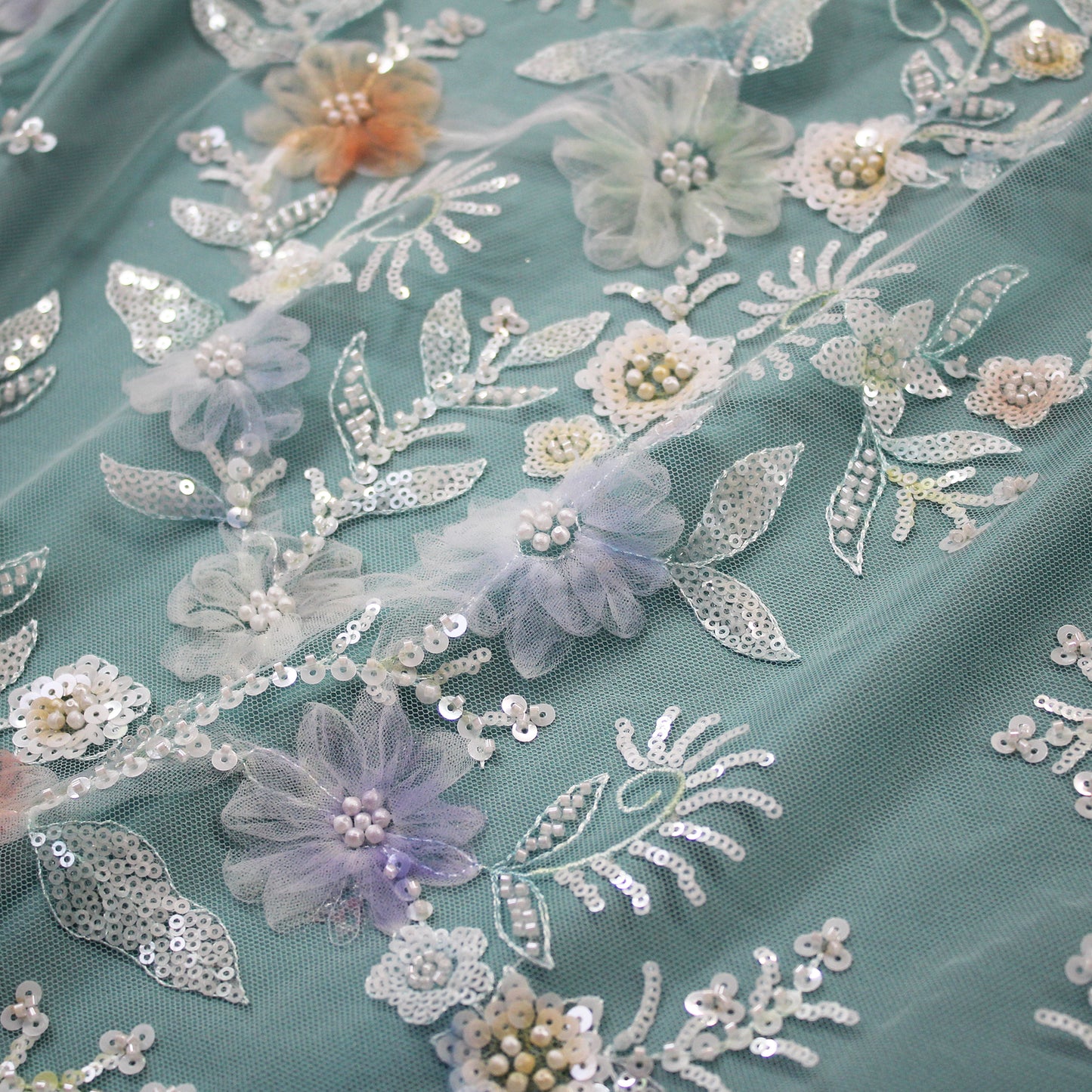 Embroidered Tulle with Ombre Tulle Flowers, Leaves, Paillettes, and Corals