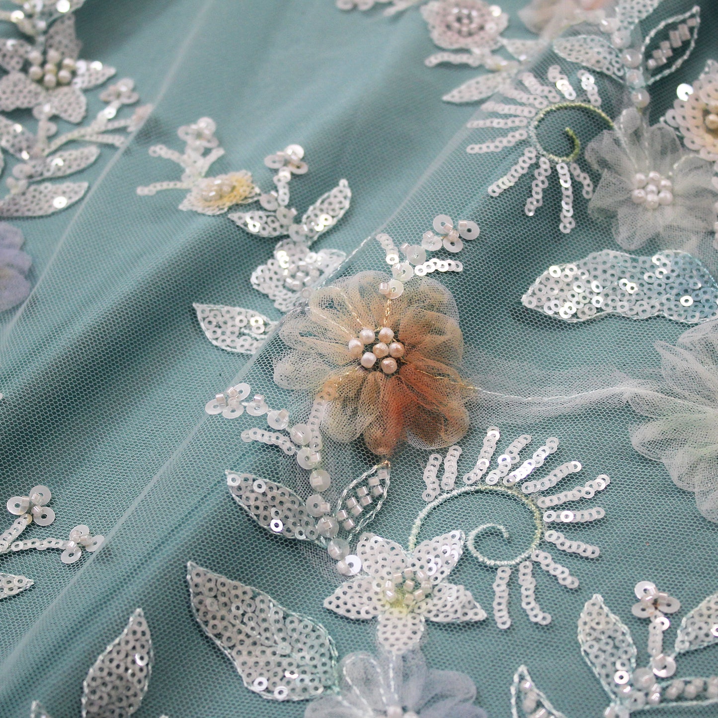 Embroidered Tulle with Ombre Tulle Flowers, Leaves, Paillettes, and Corals