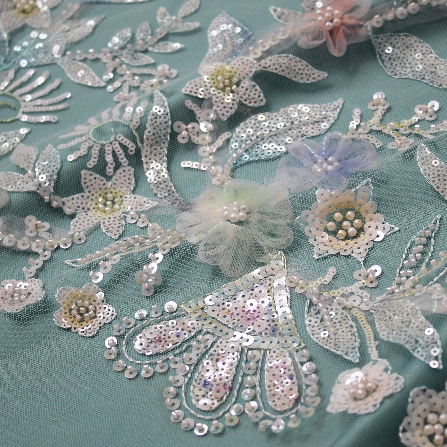 Embroidered Tulle with Ombre Tulle Flowers, Leaves, Paillettes, and Corals