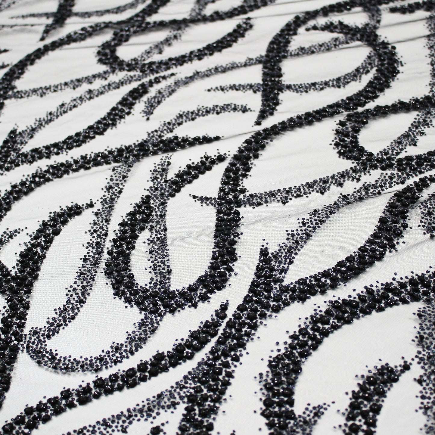 Embroidered Glitter Tulle with Wave Interlacing