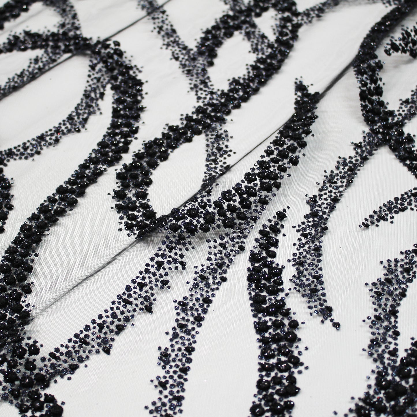 Embroidered Glitter Tulle with Wave Interlacing