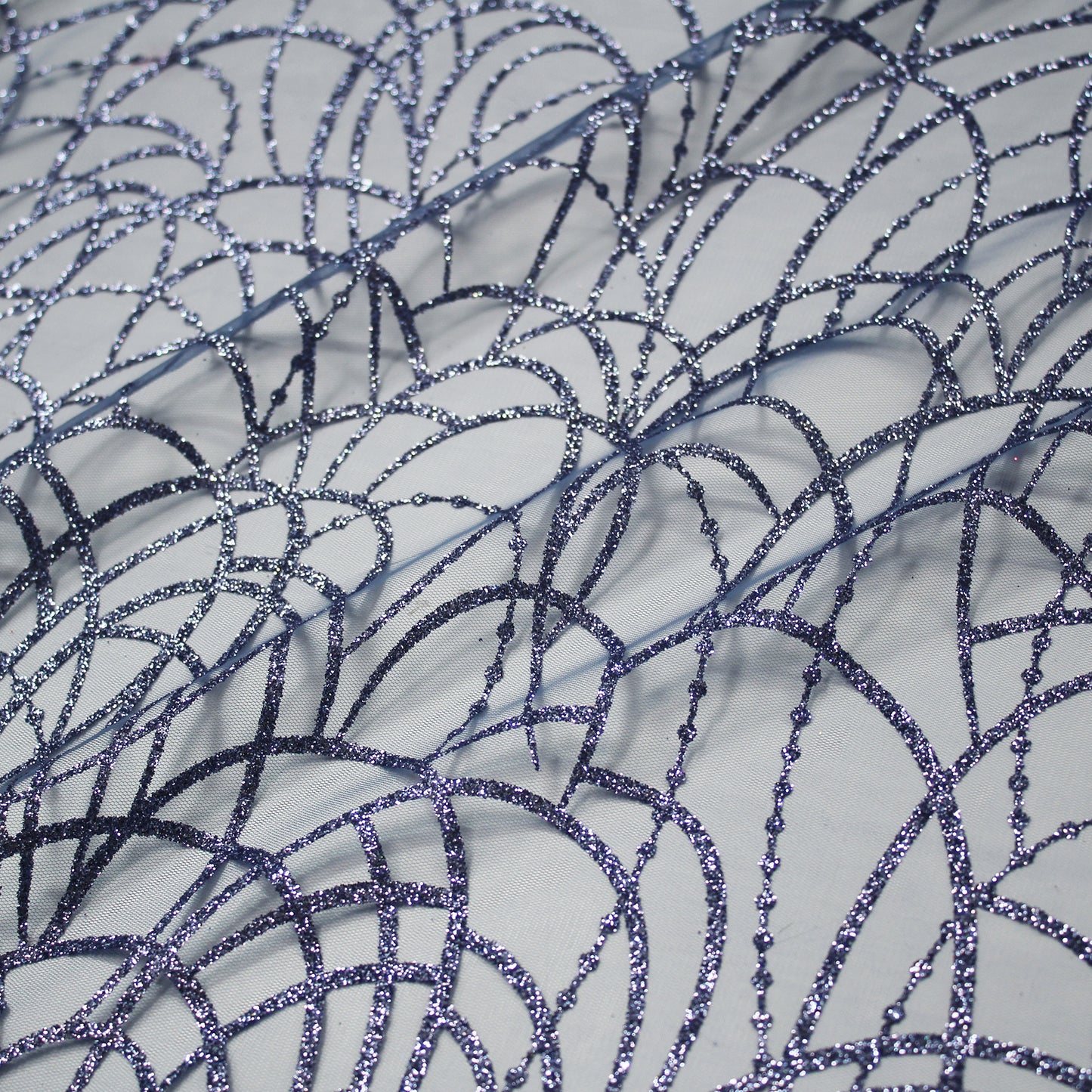 Embroidered Glitter Tulle with Scribbled Interlaced Curved Circular Lines