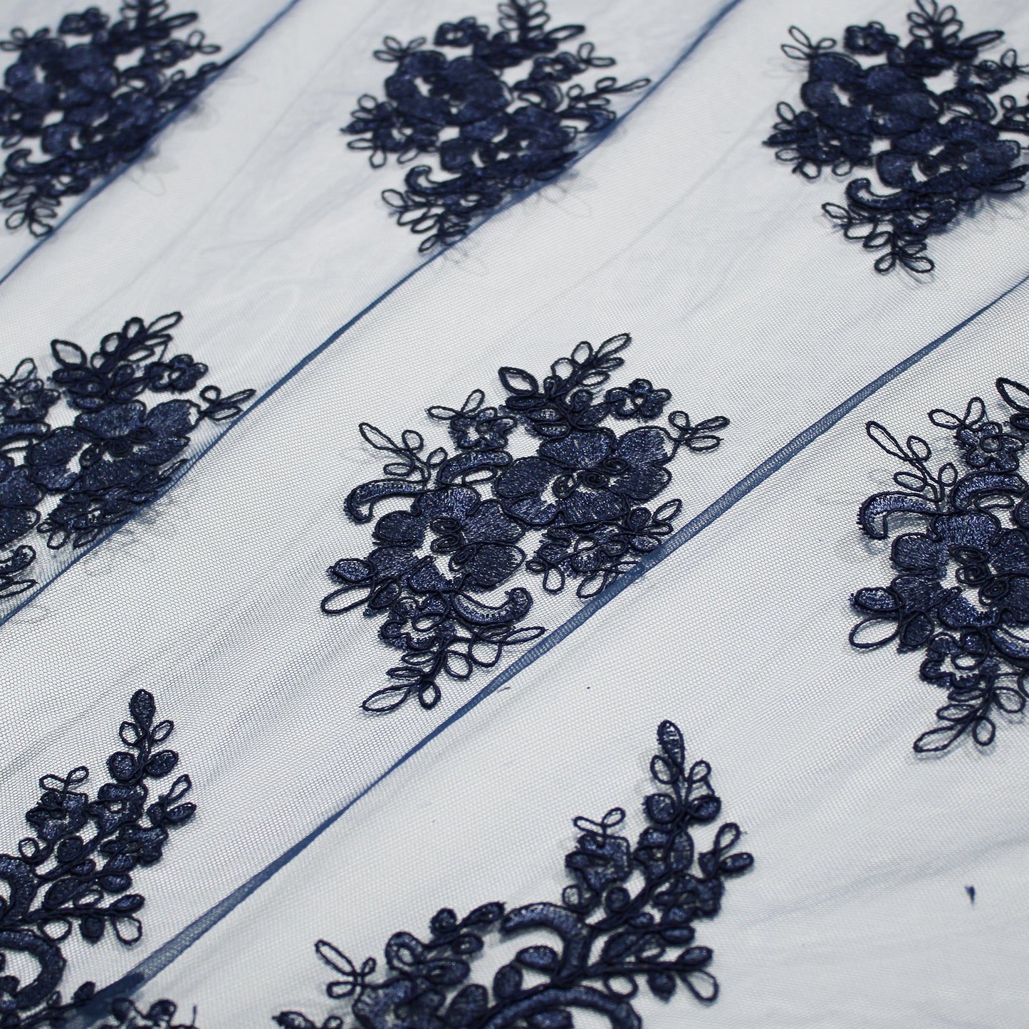 Double Border Embroidered Rebrodé Tulle with Cut-Out Embroideries for Applications