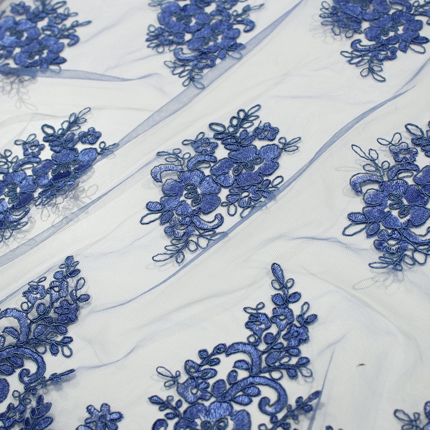 Double Border Embroidered Rebrodé Tulle with Cut-Out Embroideries for Applications