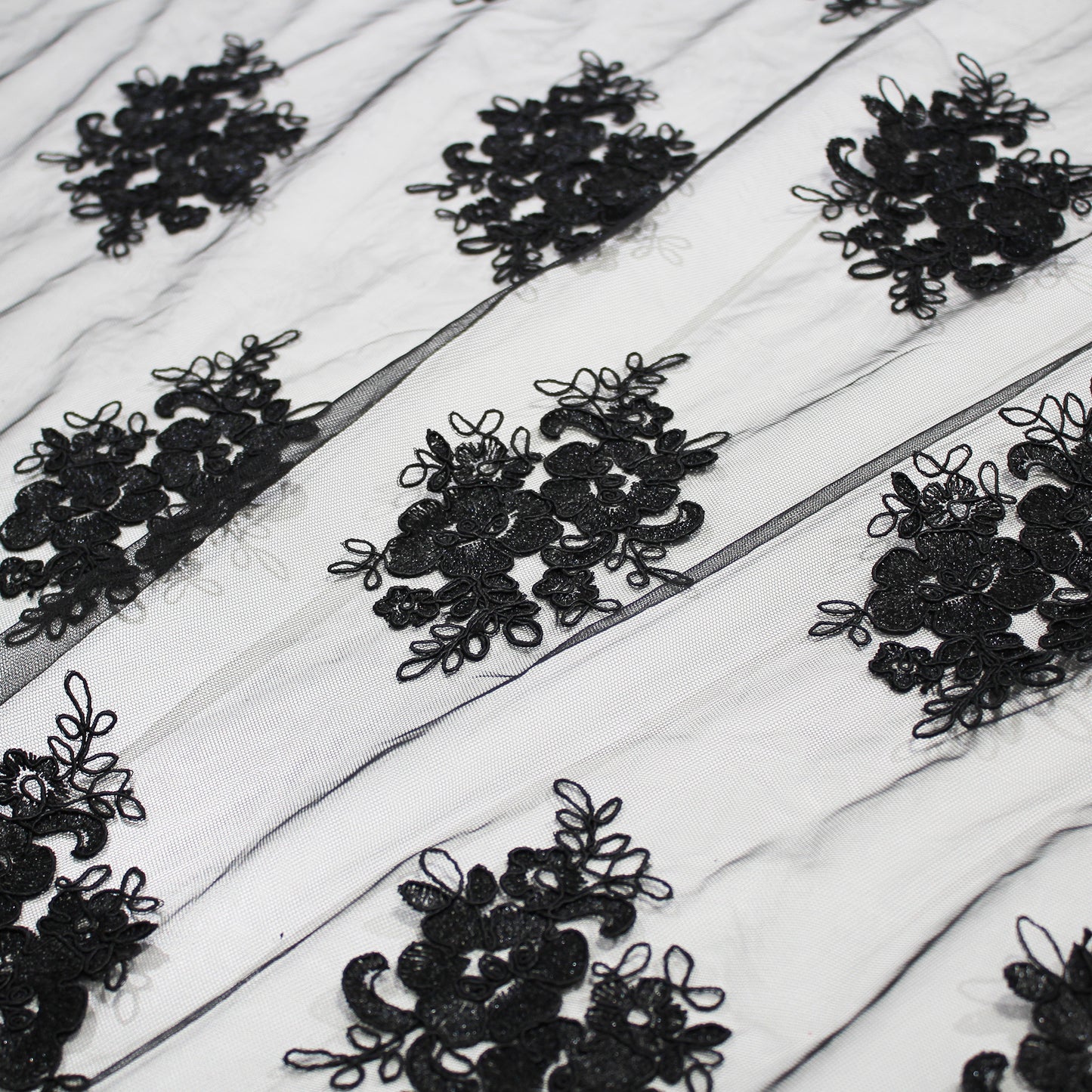 Double Border Embroidered Rebrodé Tulle with Cut-Out Embroideries for Applications