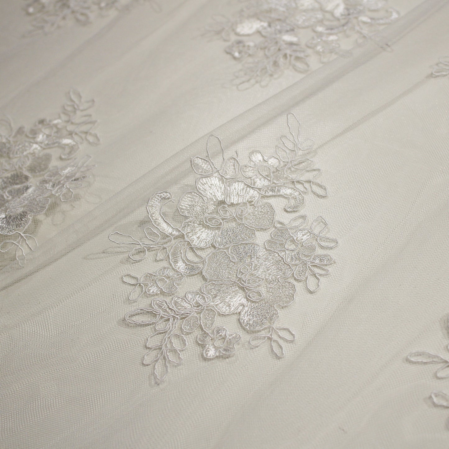 Double Border Embroidered Rebrodé Tulle with Cut-Out Embroideries for Applications