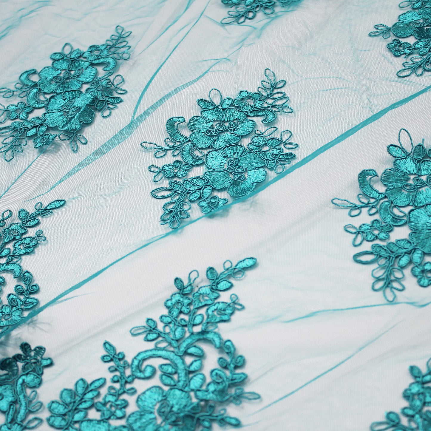 Double Border Embroidered Rebrodé Tulle with Cut-Out Embroideries for Applications