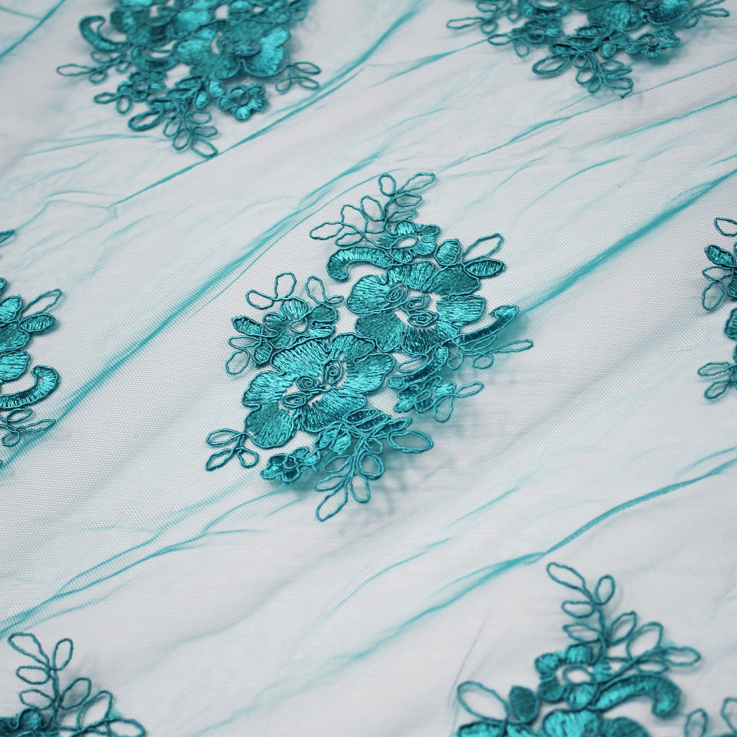Double Border Embroidered Rebrodé Tulle with Cut-Out Embroideries for Applications
