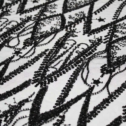 Tulle Ricamato con Paillettes e Frange di Coralli